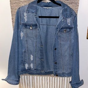 Cute distressed jean jacket. Never worn, didn’t fit! Perfect color.